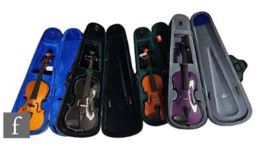 A 20th Century purple cased violin labelled Carlo Giardin, a black cased Gear 4 labelled violin,