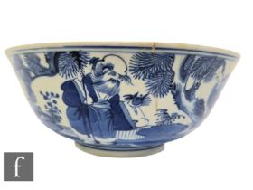 A Chinese blue and white bowl of 'U' form, rising from a low footring, decorated with immortals