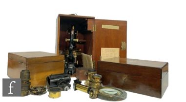 An early 20th Century part brass and black painted microscope by W Watson & Sons London, No 72485,