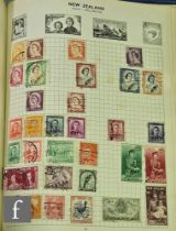 A box of assorted Great Britain and world postage stamps, mostly Queen Elizabeth II and mid to