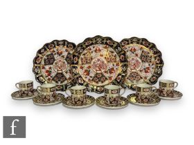 A set of six early 20th Century Aynsley coffee cans and saucers in a variant of the Old Imari