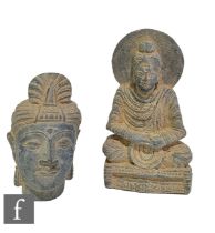 Two Gandharan Schist figural stone carvings, the first a head fragment of Maitreya wearing elaborate