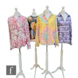 A collection of three 1980s Salvatore Ferragamo silk button up blouses, to include an example with