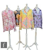 A collection of three 1980s Salvatore Ferragamo silk button up blouses, to include an example with