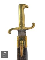 A 19th Century Prussian short bayonet and scabbard, brass mounted hilt, 43cm blade, numbers