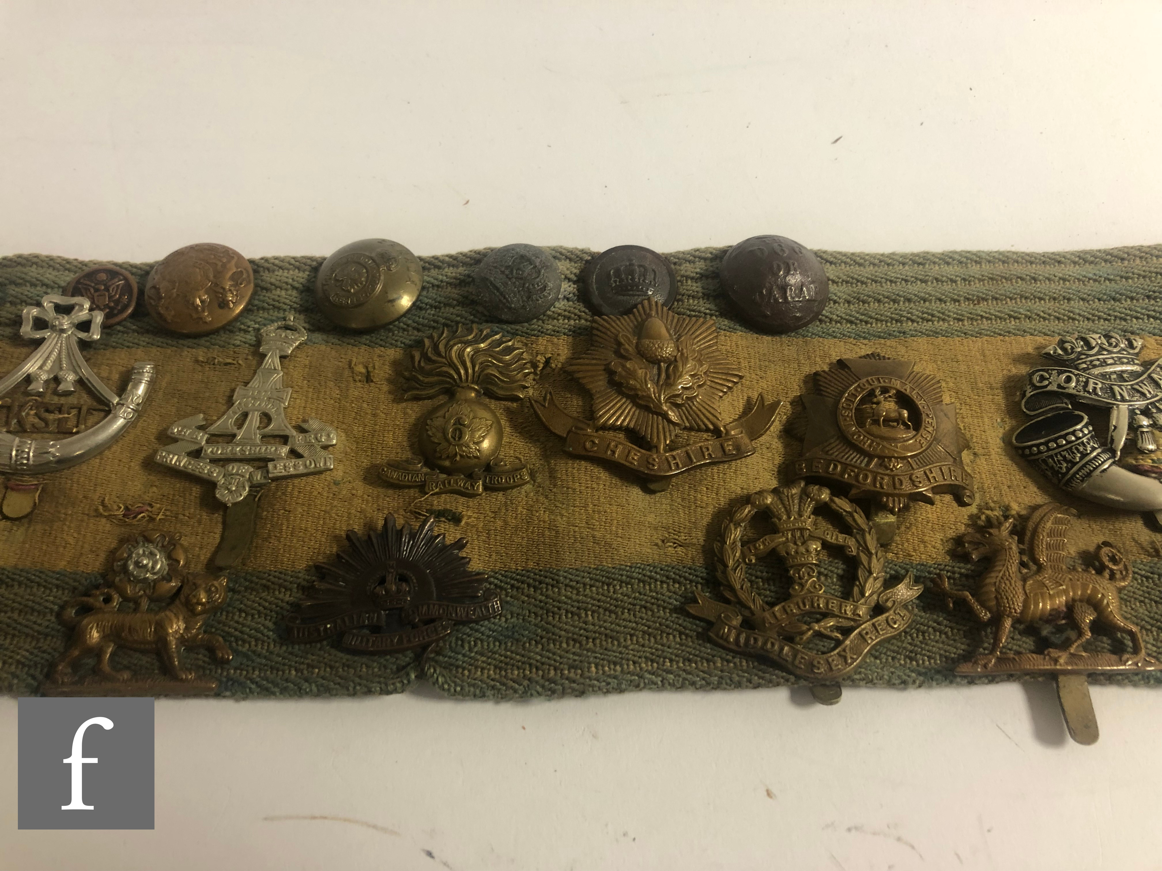 A collection of mounted military badges and buttons, various regiments, Cheshire, Manchester, - Image 3 of 7