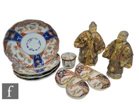 A mixed collection of Japanese items, to include four Imari dishes, two Satsuma figures, pickle