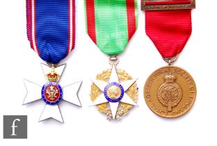 A Royal Victorian Order, C.V.O., Commander’s neck badge, silver-gilt and enamels, the reverse