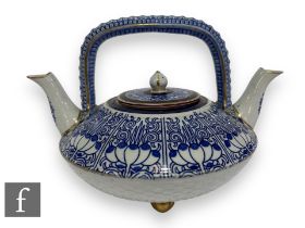 A late 19th Century Royal Worcester Porcelain Aesthetic movement double spouted teapot circa 1880,