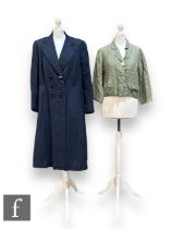 A 1950s Elgora lady's vintage double breasted navy wool coat, labelled to the interior left side