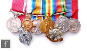 A medal group comprising a World War One trio, Defence, Imperial Service and British Empire Medals