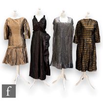 Four early to mid 20th Century lady's vintage dresses comprising of a bronze dress with three