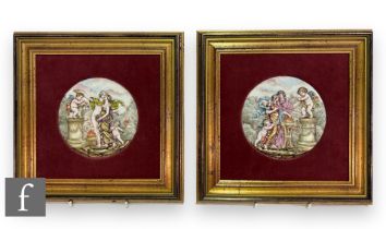 A near pair of early 20th Century Italian Capodimonte porcelain plaques of circular form, each