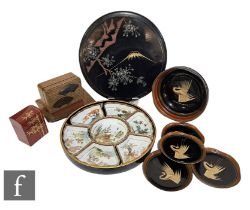 A collection of 20th Century Japanese lacquer wares, to include a circular lidded hors d'oeuvres set