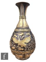 A Chinese bronze vase, Chenghua four character mark but late Qing Dynasty, of bottle form, relief