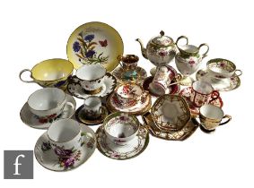 A collection of 19th Century and later china tea and coffee cups and saucers, mostly continental,