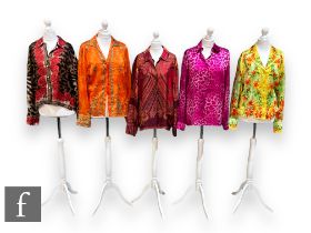 Three 1980s Escada silk button up shirts, to include a pink leopard print example, size 38 (UK