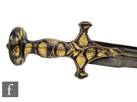 A late 19th or early 20th Century Indian Tulwar sword, curved 76cm blade, the hilt decorated with