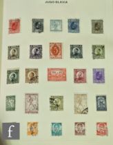 A collection of Queen Elizabeth II Great Britain postage stamps to include approximately forty