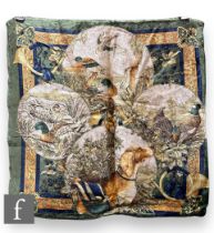 A 1990s Salvatore Ferragamo velvet cushion cover, decorated with hunting references depicting a