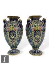 A pair of late 19th to early 20th Century Hungarian tulip vases of swollen ovoid form by Fischer,