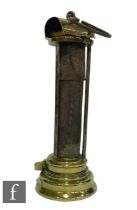 An early 19th Century brass Davy miner's lamp with flip up top and pillar sides, No 47, height 24cm.