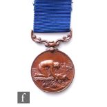 A cased bronze Liverpool Shipwreck and Humane Society Medal to Alfred Holt for Meritorious Service