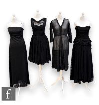Four 1950s and later lady's vintage black dresses, comprising a sheer pinstriped three quarter
