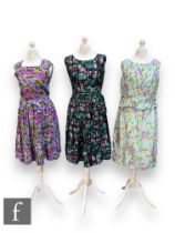 Three 1950s/60s lady's vintage sleeveless dresses, comprising a pale blue midi dress with stylised