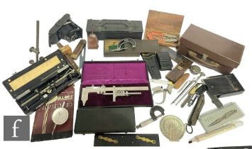 A 1930s Vernier scale, cased, various cased gauges, instruments and a light master metal, in brown