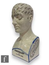 A modern reproduction phrenology head after the original by L. N. Fowler, transfer printed and