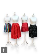 A collection of vintage lady's trousers and skirts of varying sizes and styles, to include Dorothy