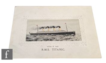 An Edwardian woven silk postcard of the R.M.S Titanic within impressed floral border.