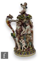 A large 20th Century Italian Capodimonte tankard and cover, heavily relief moulded with a