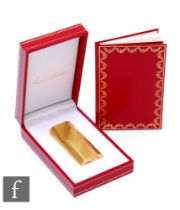 A Must De Cartier gold plated Briquet lighter, height 6cm, complete with inner and outer boxes