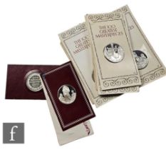 A set of John Pinches 'The One Hundred Greatest Masterpieces' silver medallions, 1977, with