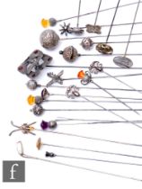 A collection of early 20th Century and later hat pins, to include various silver hallmarked and