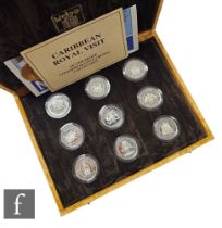 An Elizabeth II Royal Mint set of nine silver proof crowns to commemorate the Caribbean Royal Visit,