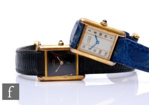 Two lady's Cartier De Must silver gilt Vermeil wrist watches, ref No 5057001 and 366001, each to a