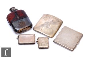 A small parcel lot of hallmarked silver to include two cigarette cases, two vesta cases and a