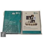 Two Elizabeth II Royal Mint Annual coin sets, 2018 and 2019, boxed and sealed. (2)
