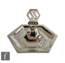A hallmarked silver hexagonal pin dish with Jaguar picked out in black enamel below the car SS logo,