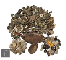 A large collection of post medieval to present day copper mounts and fittings and badges, also