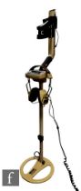 A Minelab Explorer metal detector with Dragon LD 1701 headphones, no battery pack.