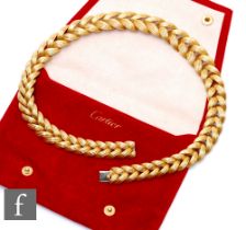 A Cartier 18ct hallmarked collarette of reeded open herringbone design, weight 107.5g, length