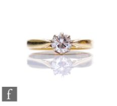 An 18ct hallmarked diamond solitaire, brilliant cut, claw set stones, weight approximately 0.50ct,