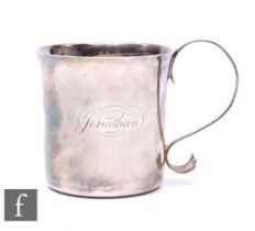 A hallmarked Britannia silver cup of plain form terminating in scroll handle, weight 6oz, London
