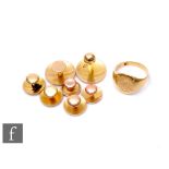 Three 18ct dress studs and an 18ct signet ring, total weight 7.4g, with a 15ct example, weight 1.2g,