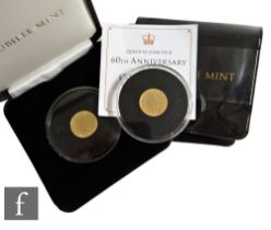 Two Elizabeth II Tristan Da Cunha 9ct gold coins to commemorate the Queens 88th birthday and the