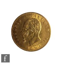 An Emmanuelle II Italy 1864 twenty Lira gold coin, 6.4g.